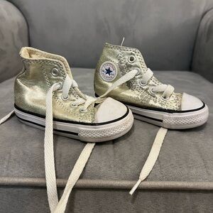 Gold high top converse